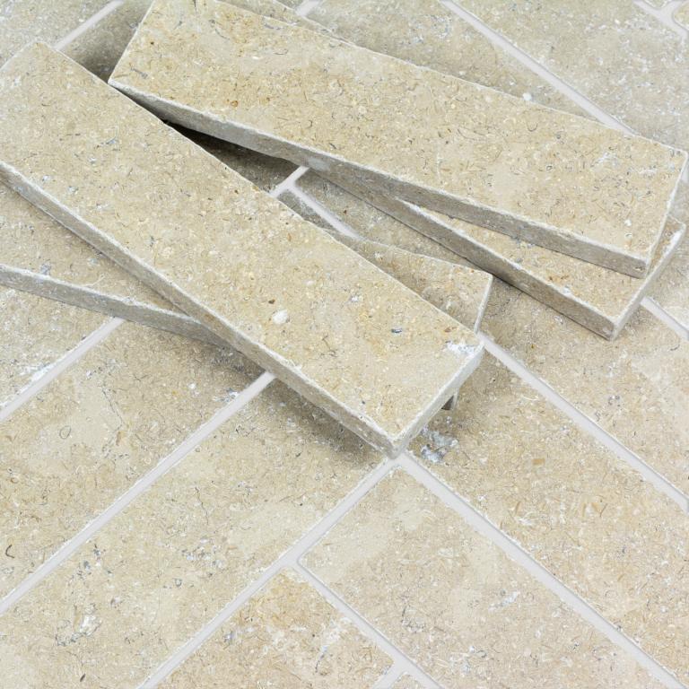 New Limestone Herringbone Tile Collection for Indoor & Outdoor Living